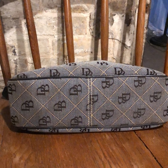 Classic Dooney & Bourke hobo with charm and leather trim - Picture 5 of 8